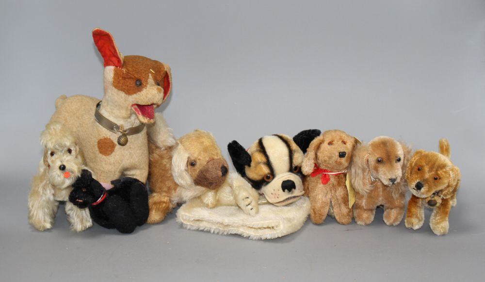 Eight assorted vintage soft toy dogs including Steiff